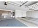 Spacious garage with ample storage cabinets and epoxy flooring at 4135 N Durango Dr, Las Vegas, NV 89129