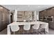Elegant kitchen boasts a large center island, custom cabinets, and built-in stainless steel appliances at 4135 N Durango Dr, Las Vegas, NV 89129