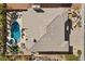 Aerial view of a home highlighting a luxurious pool, spacious backyard, well-maintained roof and landscaping at 4339 Grey Spencer Dr, Las Vegas, NV 89141