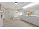 Bright bathroom with a glass shower, soaking tub, double vanity, and stylish lighting fixtures at 4339 Grey Spencer Dr, Las Vegas, NV 89141