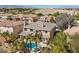 Scenic exterior view showcasing a beautiful home with a private pool, palm trees, and mountain views in the background at 4339 Grey Spencer Dr, Las Vegas, NV 89141