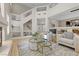 Spacious living room with modern decor, glass railing, and an open layout perfect for entertaining at 4339 Grey Spencer Dr, Las Vegas, NV 89141