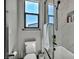 Bright bathroom features a window, sleek fixtures, a soaking tub, and a tiled shower at 4345 N Dapple Gray Rd, Las Vegas, NV 89129