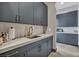 Butler's pantry with sink, cabinets and drawers for storage and meal prepping at 4345 N Dapple Gray Rd, Las Vegas, NV 89129