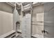 Organized walk-in closet with built-in shelving, drawers, and hanging rods for ample storage at 4345 N Dapple Gray Rd, Las Vegas, NV 89129