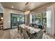 Cozy dining room features a large dining table with access to the outdoor patio area at 4345 N Dapple Gray Rd, Las Vegas, NV 89129