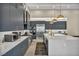 Bright kitchen features a large island, stainless steel appliances and plenty of storage at 4345 N Dapple Gray Rd, Las Vegas, NV 89129