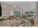 Spacious living area featuring modern design, seamless indoor-outdoor flow, and ample seating at 4345 N Dapple Gray Rd, Las Vegas, NV 89129