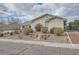 Well-maintained home with desert landscaping and gated access, combining curb appeal with security at 4350 Bossart Ct, Las Vegas, NV 89102