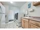 Well-organized laundry room with modern washer and dryer, cabinets, and a sink at 4350 Bossart Ct, Las Vegas, NV 89102