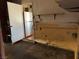 A room with an open doorway and a refrigerator at 4442 Bennett Dr, Las Vegas, NV 89121
