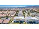 Wide aerial view of a residential neighborhood and community at 5014 Thunder River Cir, Las Vegas, NV 89148