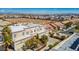 An elevated view of a neighborhood and a beautiful two-story home at 5014 Thunder River Cir, Las Vegas, NV 89148
