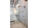 Walk-in glass shower features sleek fixtures, with a silver sink and bright vanity lights at 5014 Thunder River Cir, Las Vegas, NV 89148
