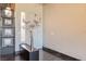 Welcoming foyer with neutral walls, and unique decorative accents.and dark tile floors at 5014 Thunder River Cir, Las Vegas, NV 89148