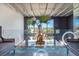Elegant living room boasting high ceilings, striking views, and a stylish glass coffee table with decor at 5014 Thunder River Cir, Las Vegas, NV 89148