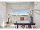 Bright home office with large window, a spacious desk, and contemporary decor, perfect for working from home at 5014 Thunder River Cir, Las Vegas, NV 89148