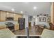 Well-lit kitchen with modern appliances and wood cabinets, offering a functional and stylish space at 5465 Cardinal Ridge Ct # 103, Las Vegas, NV 89149