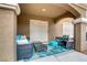 Cozy patio with comfortable seating and outdoor rug at 5465 Cardinal Ridge Ct # 103, Las Vegas, NV 89149