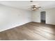 Bedroom with hardwood floors and ceiling fan at 6228 Grace Mountain St, Las Vegas, NV 89115