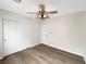 Bedroom with hardwood floors and ceiling fan at 6228 Grace Mountain St, Las Vegas, NV 89115
