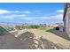 Backyard features an outdoor seating area, and fire pit. and is fully fenced at 6232 Lautman Ridge Ct, Las Vegas, NV 89141
