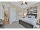 Bedroom with elegant decor, wall art, and carpeted floors at 6232 Lautman Ridge Ct, Las Vegas, NV 89141