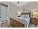 Inviting bedroom with a bed, nightstand, and soothing color scheme for relaxation at 6232 Lautman Ridge Ct, Las Vegas, NV 89141