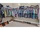 Spacious walk-in closet filled with neatly organized clothes and shoes at 6232 Lautman Ridge Ct, Las Vegas, NV 89141