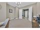 Spacious office featuring neutral walls, carpet flooring, and double door access to hallway at 6232 Lautman Ridge Ct, Las Vegas, NV 89141