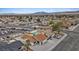 Aerial view shows a home with a pool in a residential neighborhood at 7181 Pleasant View Ave, Las Vegas, NV 89147
