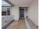 Close-up of the front door showing the entry, light fixture and mailbox at 7181 Pleasant View Ave, Las Vegas, NV 89147