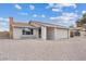 Attractive single-story home with a clean design and easy-care gravel front yard at 7181 Pleasant View Ave, Las Vegas, NV 89147