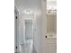Hallway that leads to bathroom with a view of a bedroom at 7181 Pleasant View Ave, Las Vegas, NV 89147