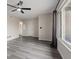 Spacious living room with a ceiling fan and a view of the front yard at 7181 Pleasant View Ave, Las Vegas, NV 89147