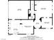 Detailed floor plan showcasing the layout of the first floor, including the kitchen, living room, and garage at 7609 Trimming Ct, Las Vegas, NV 89149