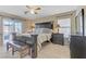 Well-lit main bedroom features a large bed and a sliding door to the balcony at 7609 Trimming Ct, Las Vegas, NV 89149