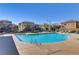 Beautiful community pool with lounge chairs and well-maintained surroundings, perfect for relaxing on sunny days at 7609 Trimming Ct, Las Vegas, NV 89149
