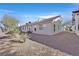 Nice backyard with desert landscaping in a home at 7722 Top Hat Ave, Las Vegas, NV 89113