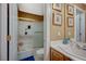 Bathroom featuring vanity, sink, mirror, toilet, and shower at 8093 Luna Sera Ave, Las Vegas, NV 89178