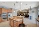 Spacious kitchen with a center island, stainless steel appliances, and an open layout at 8093 Luna Sera Ave, Las Vegas, NV 89178