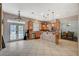 Well-lit kitchen with stainless steel appliances, center island, and easy access to dining area at 8093 Luna Sera Ave, Las Vegas, NV 89178