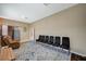 Inviting living area with a brown recliner, seating, and beautiful rug at 8093 Luna Sera Ave, Las Vegas, NV 89178