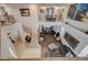 Spacious living room and dining room area with staircase and decorative features at 8093 Luna Sera Ave, Las Vegas, NV 89178