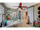 Well-organized home office featuring a ceiling fan, ample storage, and a bright workspace at 8093 Luna Sera Ave, Las Vegas, NV 89178