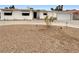 Charming single-story home with low-maintenance landscaping and a circular driveway at 810 Kenny Way, Las Vegas, NV 89107