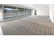 Bright living room featuring a fireplace and large windows, providing backyard view at 810 Kenny Way, Las Vegas, NV 89107