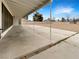 Covered patio overlooking large backyard, perfect for outdoor entertaining at 810 Kenny Way, Las Vegas, NV 89107