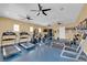 Well-equipped fitness center with multiple treadmills, weights, and exercise machines for a complete workout at 8520 Insignia Ave # 104, Las Vegas, NV 89178