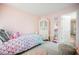 Bright bedroom with a mermaid themed bed, plush decor, and ample natural light at 8890 Bonneville Peak Ct, Las Vegas, NV 89148